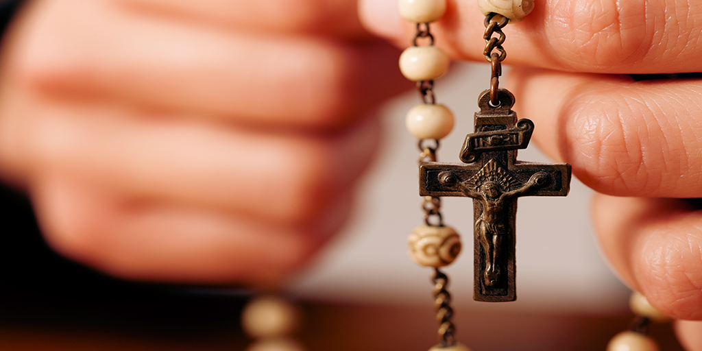 Catholics Pay Settlement.